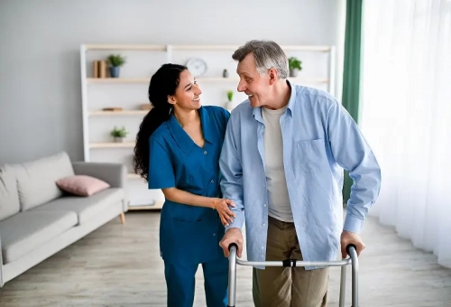 bigstock-Female-Caregiver-Assisting-Eld-425350448 (1).webp