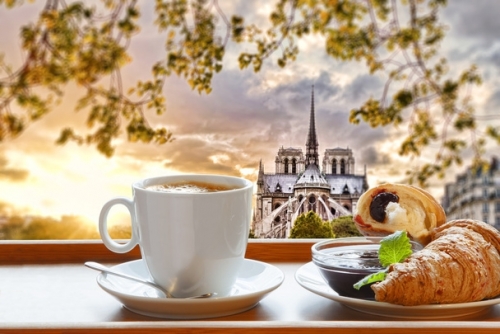 stock-photo-notre-dame-cathedral-with-coffee-and-croissants-in-paris-france.jpeg