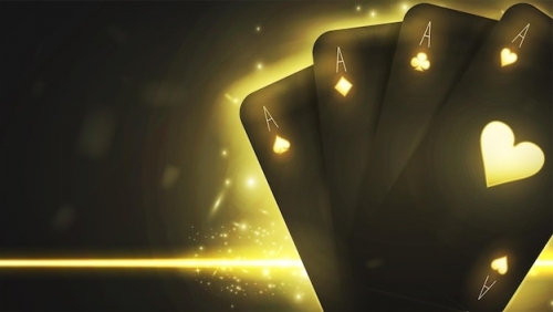 background-casino-with-black-gold-cards-dark-background-with-bright-yellow-light_851328-169.jpg