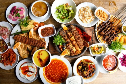 Turkish-Doner-Kebab-among-other-traditional-Turkish-meals-min-scaled.webp